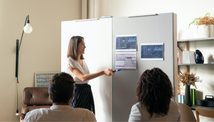 girl presenting in board room